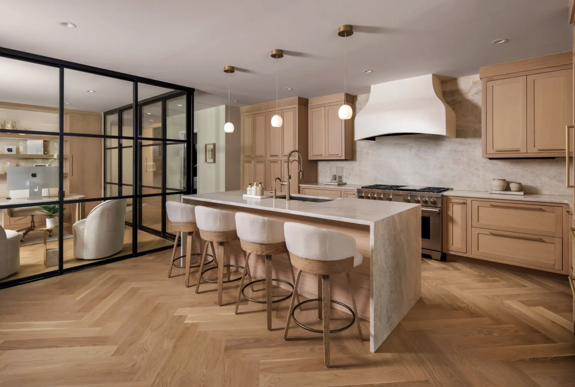 Cherry Creek kitchen with white oak cabinetry, plaster hood, and quartzite waterfall island