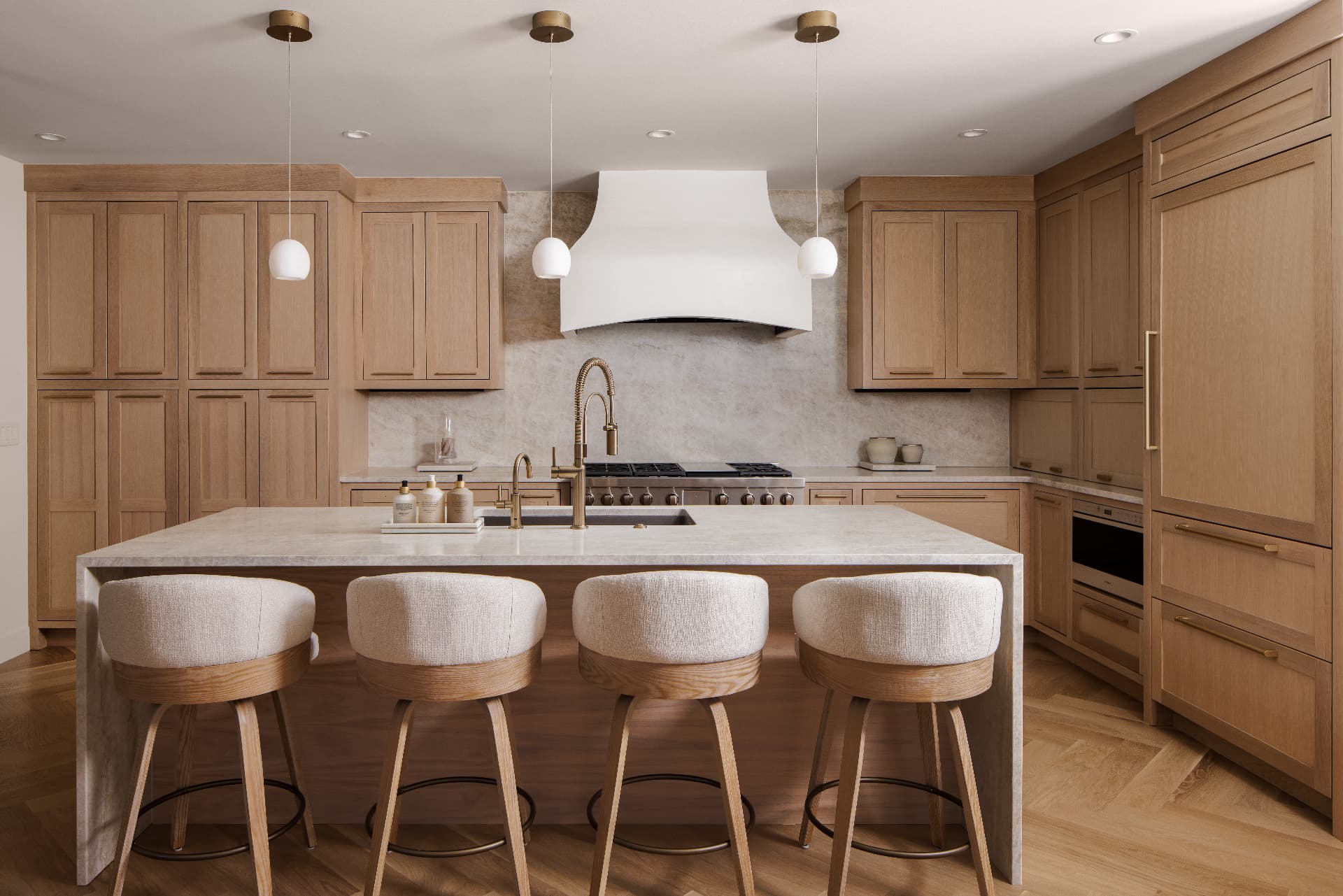 Cherry Creek kitchen with white oak cabinetry, curved plaster hood, and upholstered counter stools