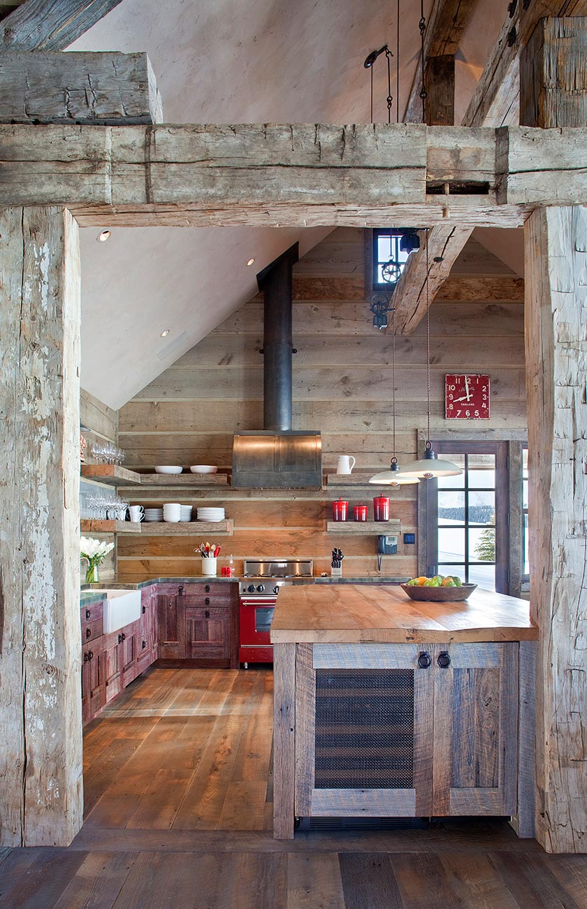 Reclaimed-timber kitchen with open shelving and a butcher-block island